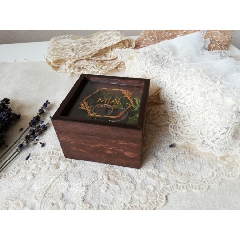 Personalized wooden ring box with transparent lid and moss