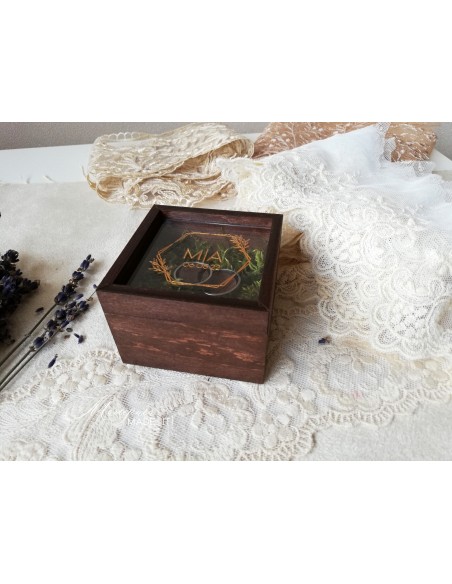 Personalized wooden ring box with transparent lid and moss