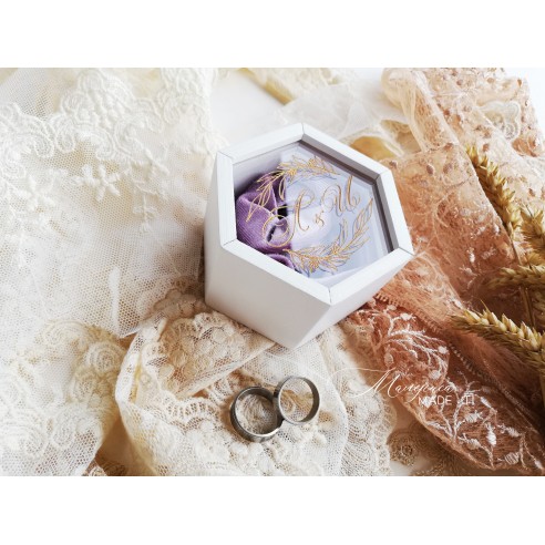 Wooden ring box with engraved design and clear lid lid