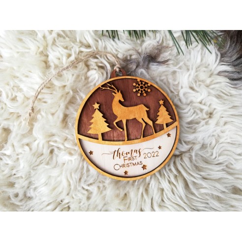 Round wooden Christmas tree ornament with deer
