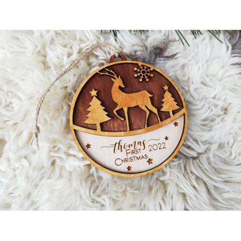 Round wooden Christmas tree ornament with deer