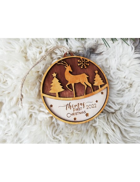 Round wooden Christmas tree ornament with deer