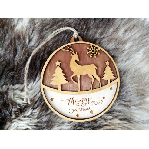 Round wooden Christmas tree ornament with deer