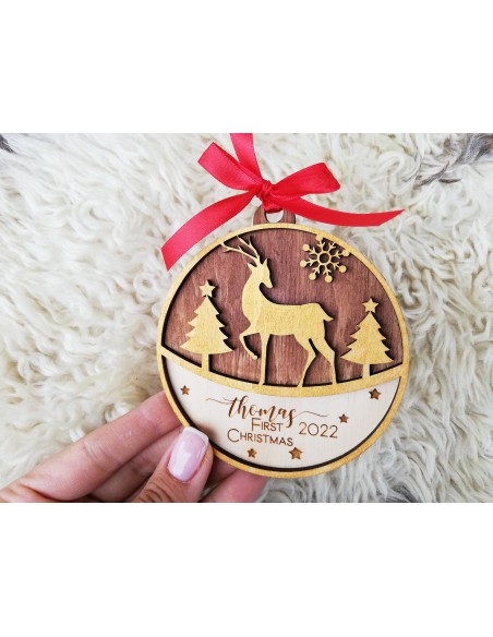 Round wooden Christmas tree ornament with deer
