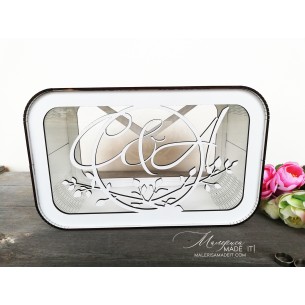 White wooden wedding box for envelopes and gifts with a personalized laser-cut inscription and decorative design.