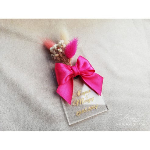 Guest gift with satin ribbon and dried flowers