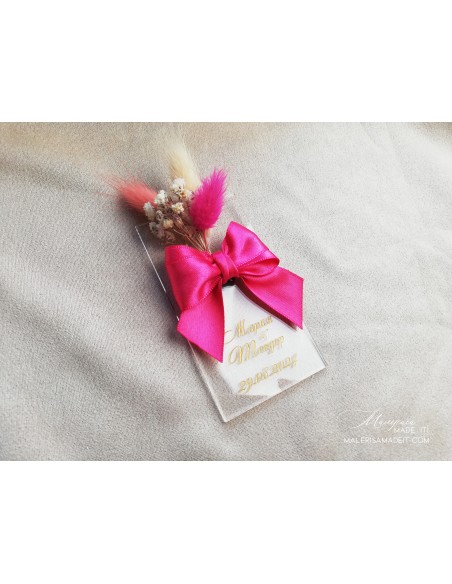 Guest gift with satin ribbon and dried flowers