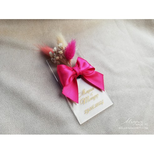 Guest gift with satin ribbon and dried flowers