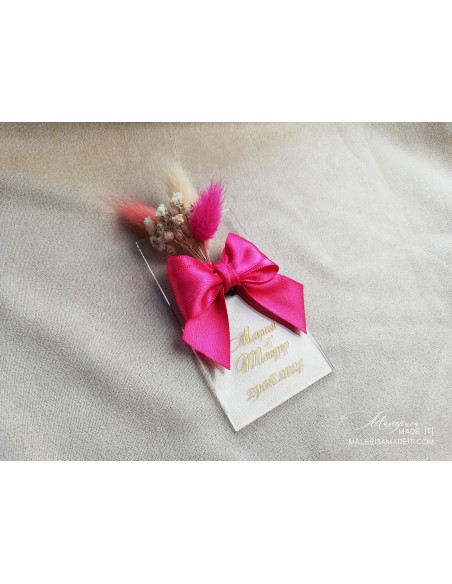 Guest gift with satin ribbon and dried flowers