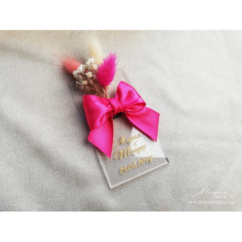 Guest gift with satin ribbon and dried flowers