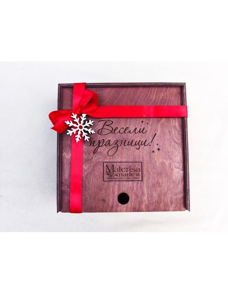 Open square box with corporate gourmet products and elegant arrangement