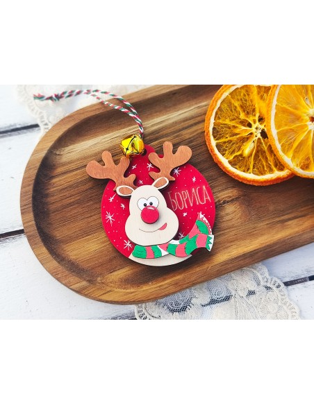 Wooden Christmas ornament with a name and a reindeer