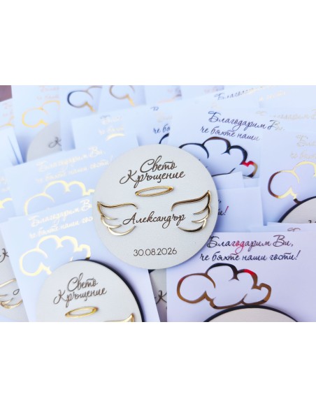 Small favor for holy christening guests featuring angel wings